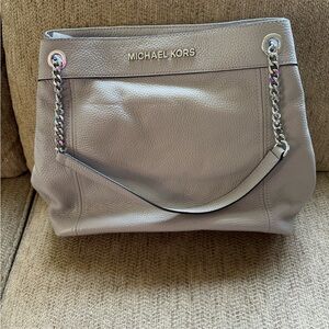 Michael Kors pebble leather gray shoulder bag and wallet.